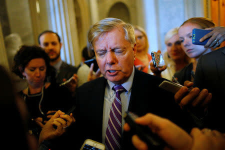 U.S. Senator Lindsey Graham (R-SC) speaks to reporters about proposed legislation to repeal Obamacare, after the weekly Republican caucus policy luncheon at the U.S. Capitol in Washington, U.S. September 19, 2017. REUTERS/Jonathan Ernst