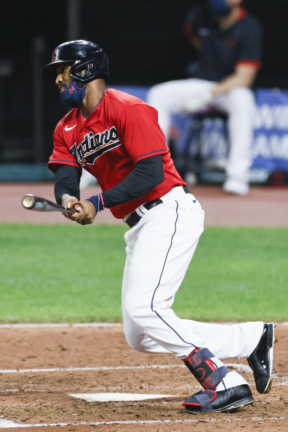 Cleveland Indians' Domingo Santana hits a three-run double off Detroit Tigers pitcher John Schreiber during the sixth inning of a baseball game, Saturday, Aug. 22, 2020, in Cleveland. (AP Photo/Ron Schwane)