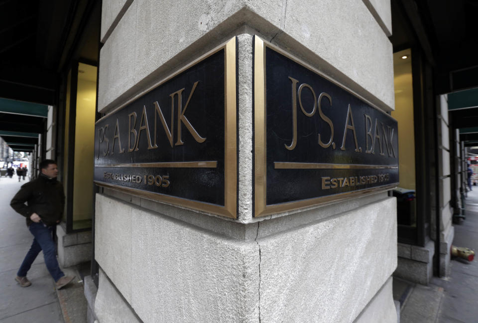 A man enters a Jos. A. Bank store, in New York. Men's Wearhouse is still trying to figure out the best strategy for its business since buying rival Jos. A. Bank, but needs to move quickly as its struggles continue. The men's clothing retailer reported Thursday, Dec. 10, 2015, that sales at Jos. A Bank locations open at least a year tumbled 14.6 percent in the third quarter as fewer customers visited those shops Mens Wearhouse Jos A Bank, New York, USA