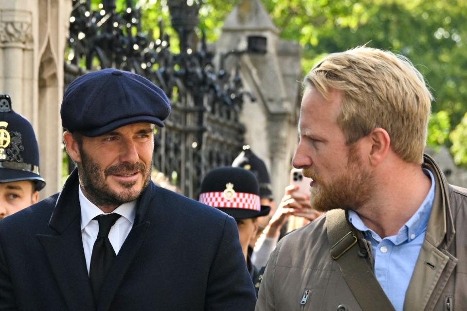 The footballer pictured in the queue last month (AFP via Getty Images)