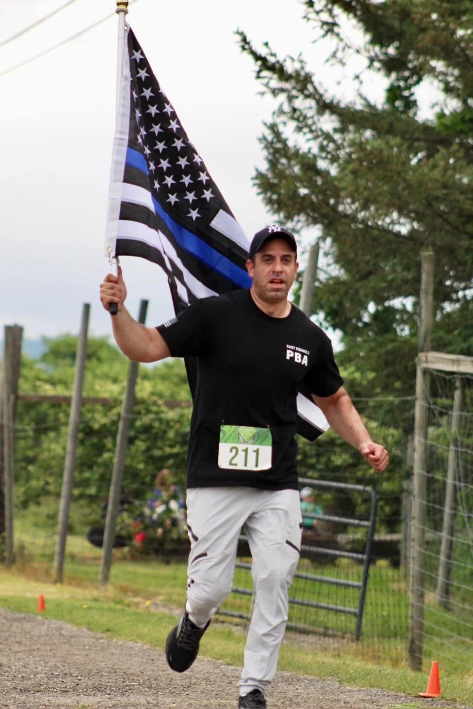 Officer Daniel P. DiDato at the Superhero 5K run for Sparrow's Nest at Barton Orchards in Poughquag on June 3, 2023.