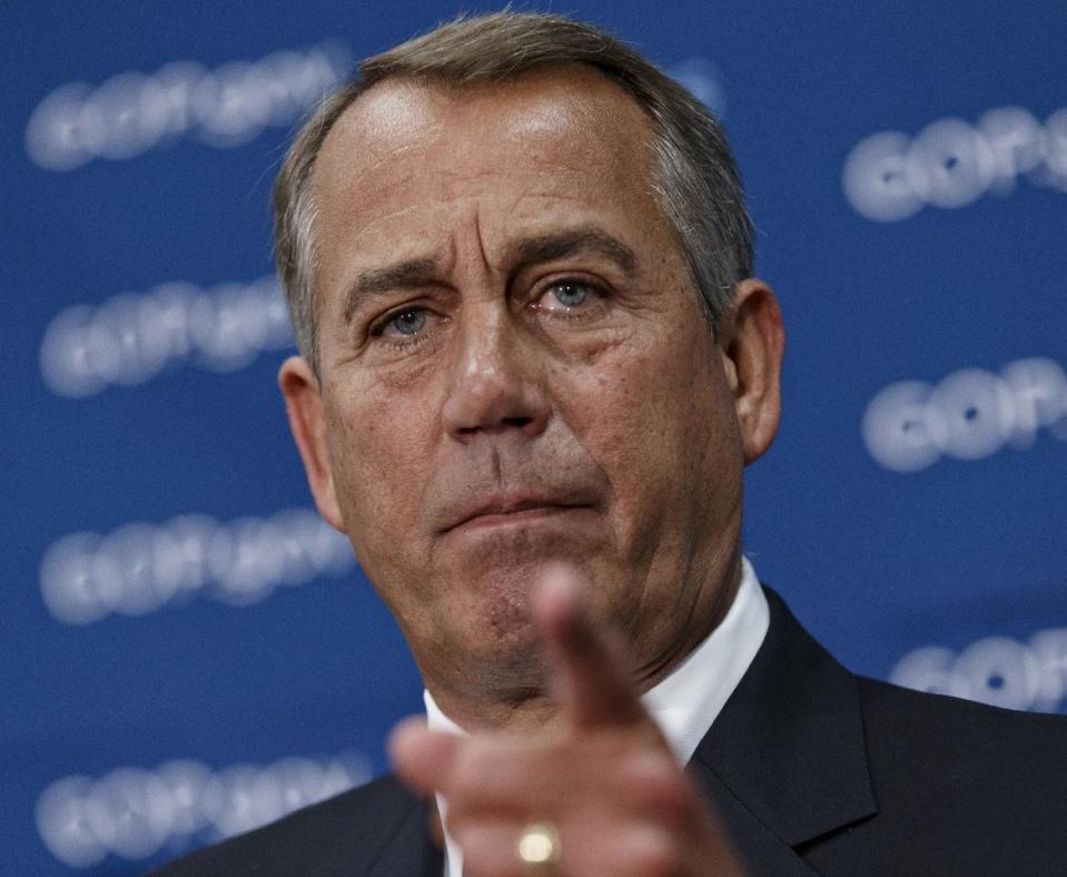 House Speaker John Boehner of Ohio meets with reporters on Capitol Hill in Washington, Wednesday, Feb. 26, 2014, following a Republican caucus. When asked about House Ways and Means Committee Chairman Rep. Dave Camp, R-Mich., and his plan to release a rewrite of the nation’s tax code later today, Boehner distanced himself from the details and wouldn't promise a House vote on the plan this year. (AP Photo/J. Scott Applewhite)