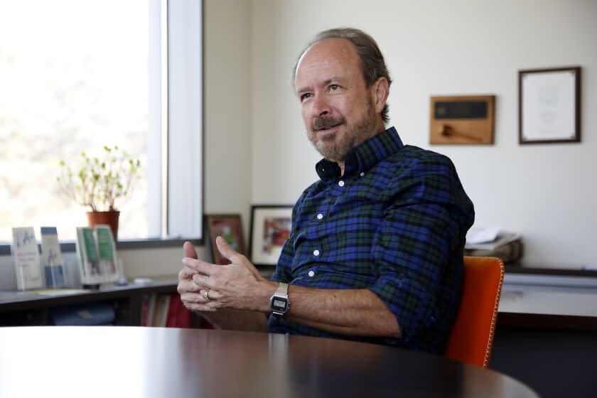 LOS ANGELES, CA: June 23, 2015 - Dennis Deapen, DrPH, a professor in the Department of Preventive Medicine at USC and the director of the program that tracks ever case of cancer in the county, known as cancer surveillance, is interviewed in his office on the USC Health Sciences Campus. Los Angeles has one of the oldest and most robust programs nationwide that tracks every case of cancer in the county, which is known as cancer surveillance. It's an essential piece of preventing cancer, since doctors need to know who's getting cancer to deduce what's causing it. The program is now changing its focus, looking more at who isn't getting access to the treatments and prevention tools they should be, instead of using the data solely to figure out who's getting cancer. Registries like this are becoming more and more common since the implementation of the Affordable Care Act, which tries to shift the focus from treatment for diseases to public health and keeping people healthy. Registries like this look at health on a large scale, tracking how a population is or isn't staying healthy, instead of treating patients on a case by case basis. (Photo by Katie Falkenberg / Los Angeles Times)