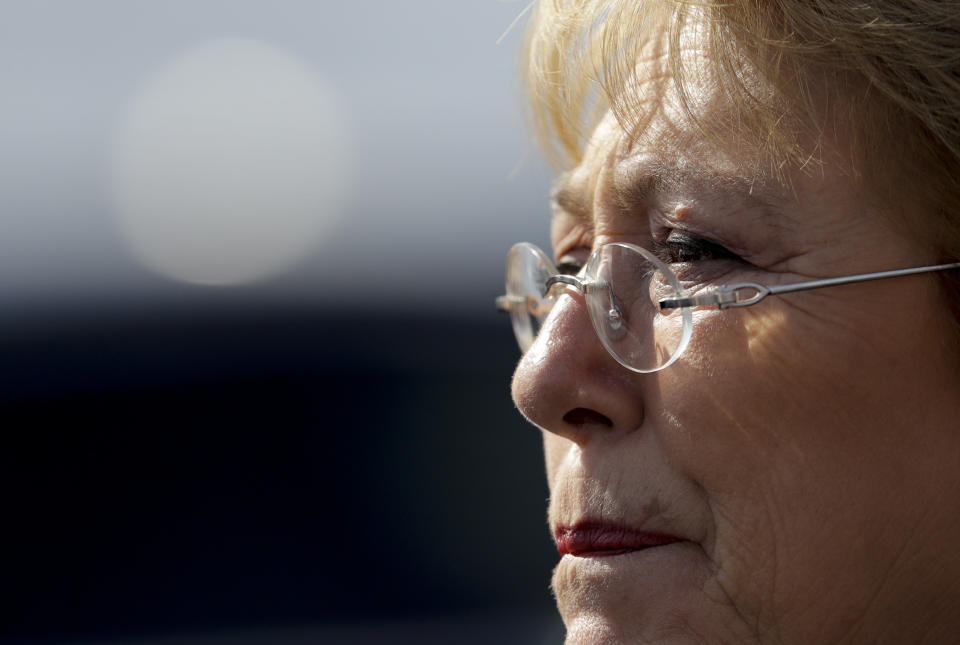 FILE - In this July 20, 2017, file photo, Chile's President Michelle Bachelet looks on during a visit to Memory Park which honors the victims of the country's dictatorship, in Buenos Aires, Argentina. The U.N. General Assembly on Friday, Aug. 10, 2018, approved Bachelet as the next U.N. human rights chief by consensus. (AP Photo/Natacha Pisarenko, File)