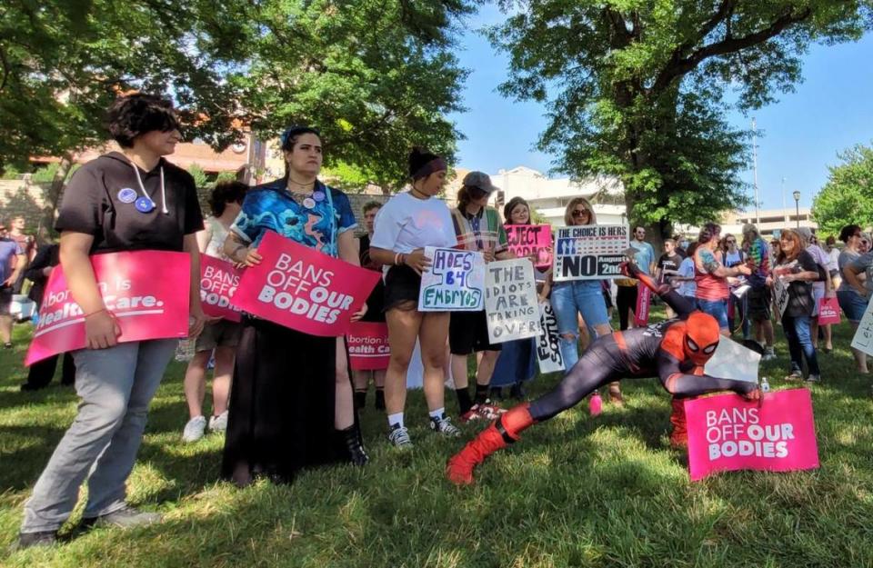 After the Supreme Court overturned Roe v. Wade, protesters gathered to voice their opposition to the ruling overturning federal protections for abortion rights during a Decision Day rally on Friday, June 24, 2022 at Mill Creek Park in Kansas City.