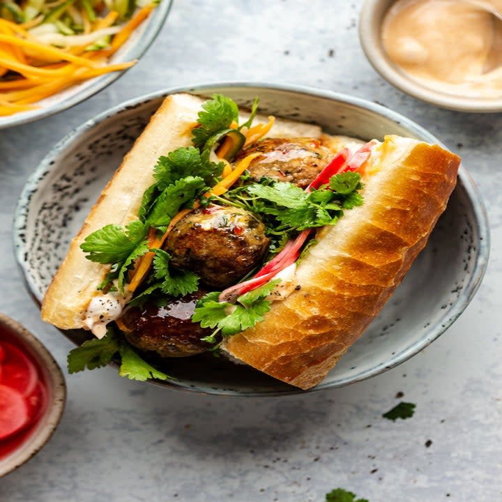 Lemongrass meatballs in a baguette