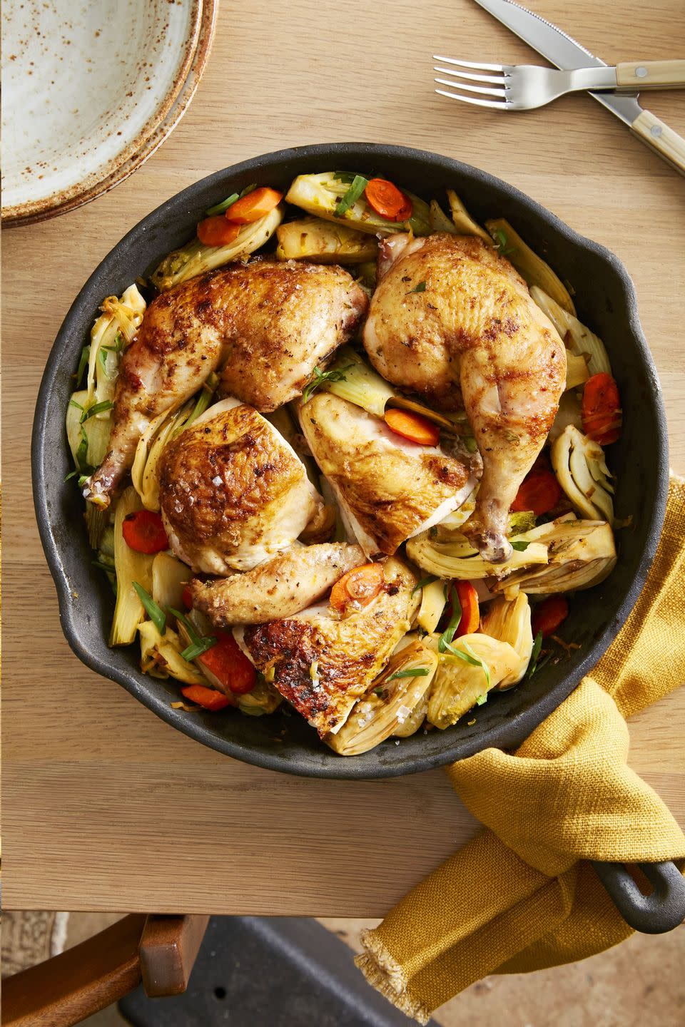 roast chicken with tarragon braised fennel in a cast iron skillet