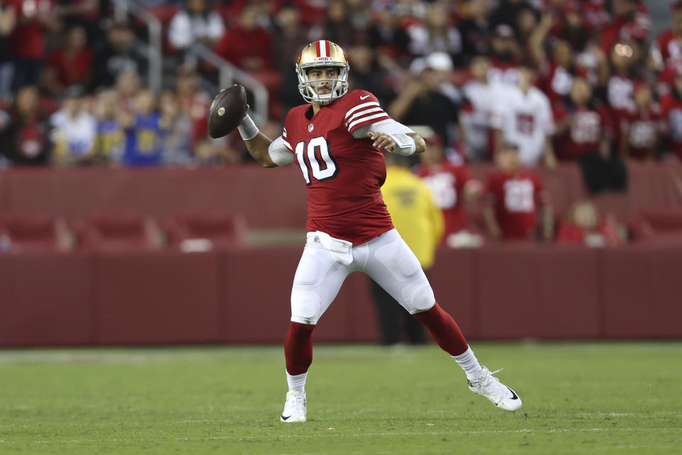 San Francisco 49ers quarterback Jimmy Garoppolo (10) passes against the Los Angeles Rams during the second half of an NFL football game in Santa Clara, Calif., Monday, Oct. 3, 2022. (AP Photo/Jed Jacobsohn)