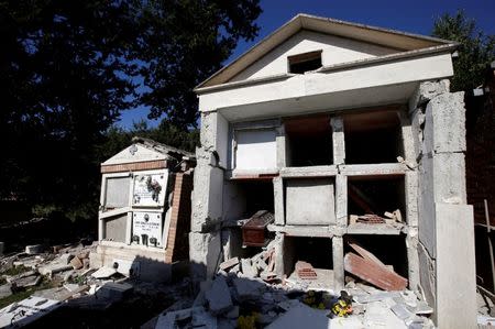 Damaged family chapels are seen in a cemetery following an earthquake at Sant' Angelo near Amatrice, central Italy, August 26, 2016. REUTERS/Max Rossi