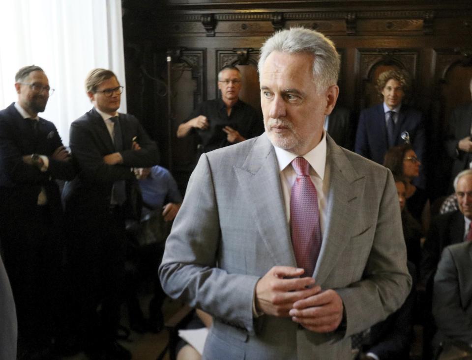 Ukrainian oligarch Dymitro Firtash waits for the start of his trial at the Austrian supreme court in Vienna, Austria, Tuesday, June 25, 2019. Austrian supreme court rules on extradition case of Ukrainian oligarch Dymitro Firtash to the US. (AP Photo/Ronald Zak)