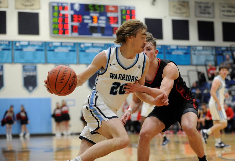 Adena junior Joedy Ater (#20) drives to the basket during a game against Circleville on Dec. 1, 2022. Adena lost the game 73-62 in double overtime.