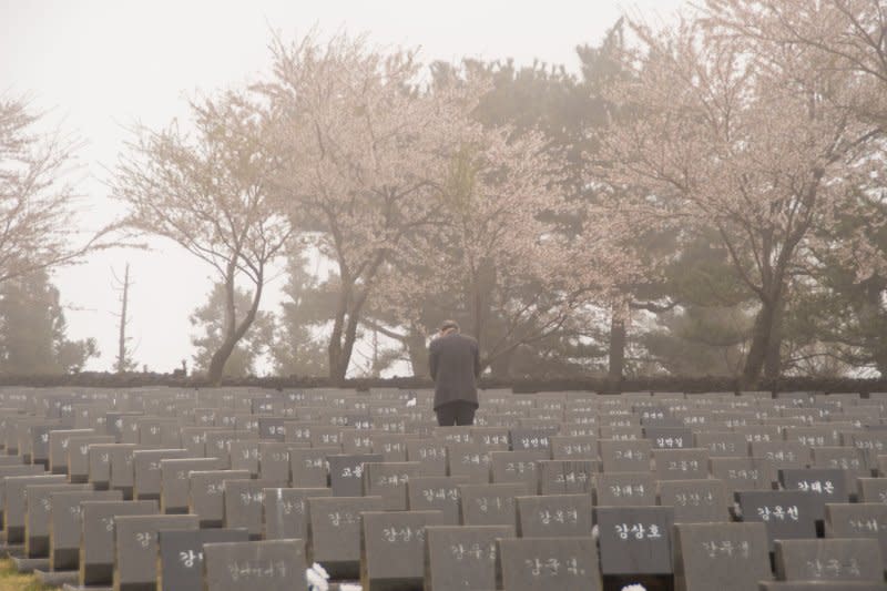A man pays his respects during the 76th anniversary of the Jeju 4.3 memorial ceremony at the Jeju 4.3 Peace Park in Jeju City, South Korea, on Wednesday. Photo by Darryl Coote/UPI