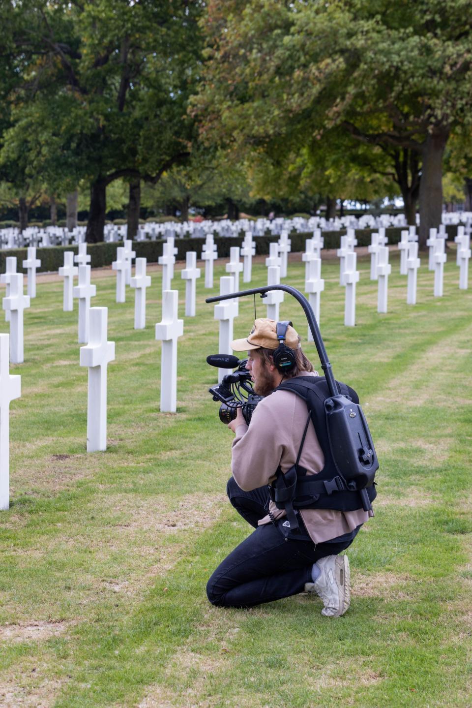 Director Austin Rich at the World War II Cambridge American Cemetery in Cambridge, England, which contains the remains of more than 3,800 Americans.