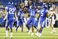 Kentucky linebacker Marquez Bembry (42) celebrates stopping a Missouri drive late in the fourth quarter of an NCAA college football game in Lexington, Ky., Saturday, Sept. 11, 2021. (AP Photo/Michael Clubb)