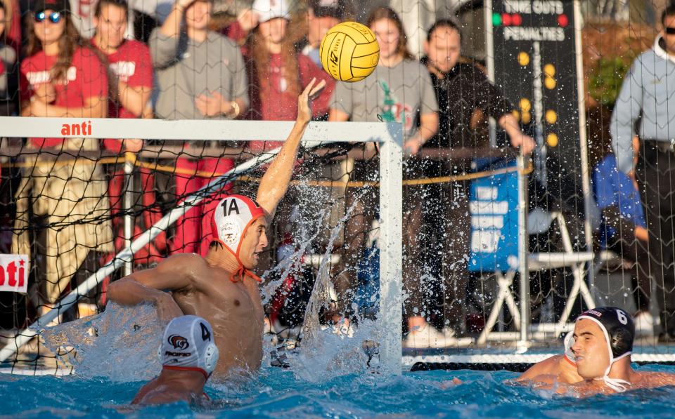 University of the Pacific Jonathan Barry (1A) blocks a goal attempt during the third quarter in the NCAA water polo championship Dec. 8, 2019, against Stanford at Pacific's Chris Kjeldsen Pool.