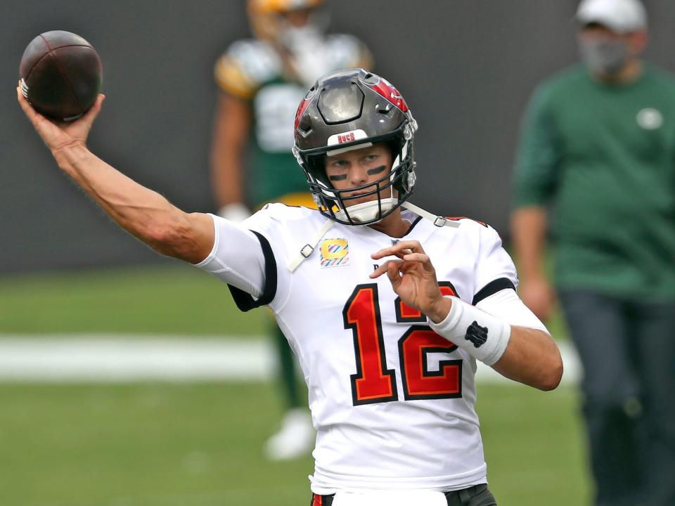 Tom Brady throws the football before a game in 2020.