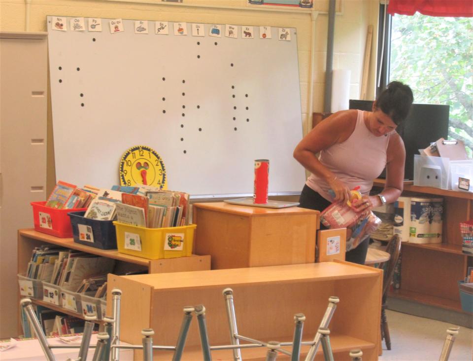 Millersburg Elementary kindergarten teacher Kelly Weiss prepares her classroom for the start of the new school year.