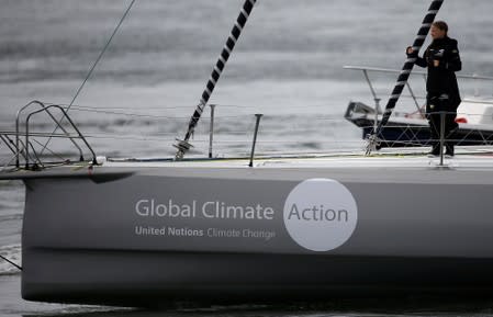 Swedish teenage climate activist Greta Thunberg stands on a yacht as she starts her trans-Atlantic boat trip to New York, in Plymouth