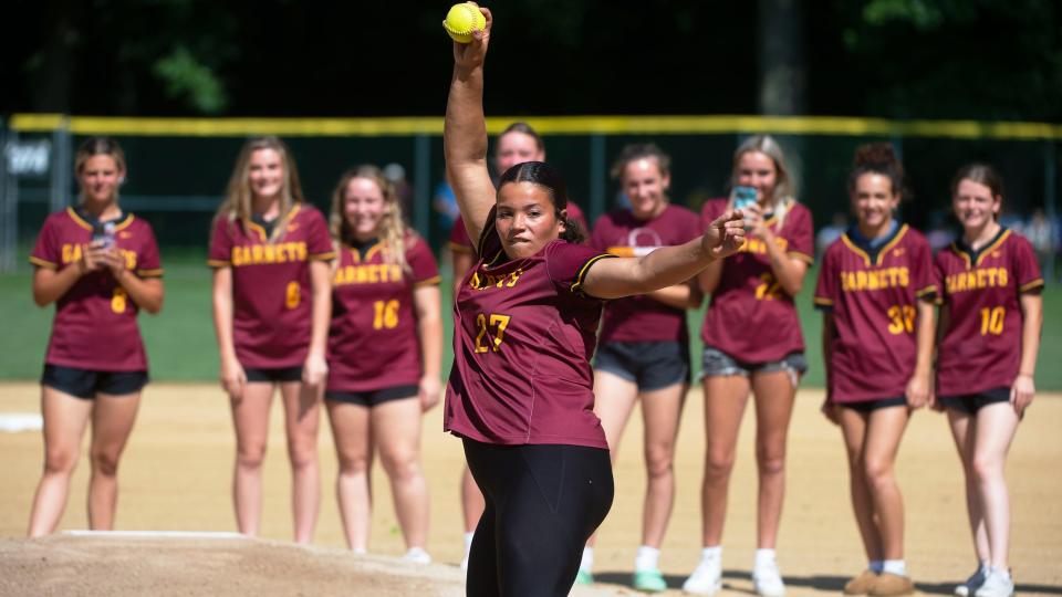 Haddon Heights High School's softball pitcher Sophia Bordi throws the ceremonial first pitch as the Haddon Heights softball team, the newly crowned Tournament of Champions winners, was honored prior to the Group 2 baseball state semifinal game between Haddon Heights and Rumson-Fair Haven played in Haddon Heights on Monday, June 13, 2022.  Haddon Heights defeated Rumson-Fair Haven, 4-2.