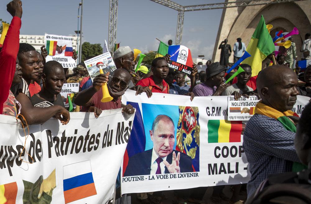 Malians demonstrate against France and in support of Russia on the 60th anniversary of the independence of the Republic of Mali in 1960, in Bamako, Mali on Sept. 22, 2020. Banner in French reads “Putin, the road to the future”. Amid a worldwide chorus of condemnation against Russia’s war on Ukraine, Africa has remained mostly quiet — a reminder of the Kremlin’s considerable influence over the continent. (AP Photo, File)