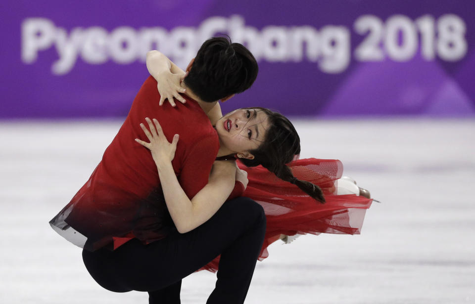 Alex Shibutani (left) and Maia Shibutani perform during the ice dance, free dance figure skating final. (AP)