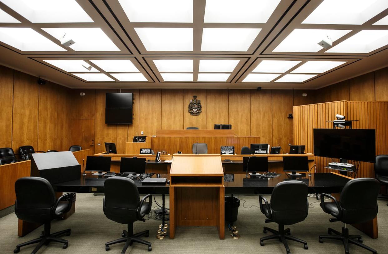 A courtroom at the Edmonton Law Courts building, in Edmonton on Friday, June 28, 2019. A stay of proceedings have been issued in the case against Robin Nasserdeen. Edmonton police charged Nasserdeen in April 2022 with one count of sexual assault. He pleaded not guilty and was awaiting trial.  (Jason Franson/The Canadian Press - image credit)