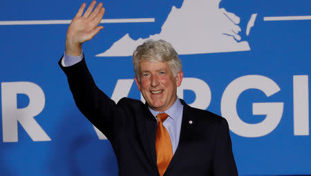 FILE PHOTO: Virginia Attorney General Mark Herring arrives at an election night rally for Governor Ralph Northam and Lt. Governor Justin Fairfax on the campus of George Mason University in Fairfax, Virginia, November 7, 2017. REUTERS/Aaron P. Bernstein/File Photo