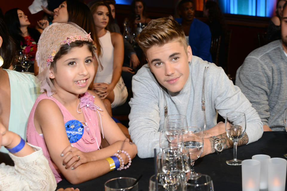 LOS ANGELES, CA - JULY 27:  Make a Wish recipient Wish Child Grace and honoree Justin Bieber (R) attend the 2014 Young Hollywood Awards brought to you by Mr. Pink held at The Wiltern on July 27, 2014 in Los Angeles, California.  (Photo by Araya Diaz/Getty Images for Mr. Pink)