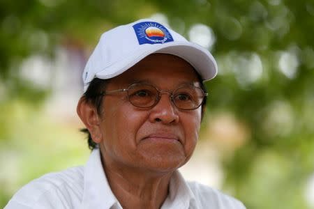 FILE PHOTO: Cambodia's opposition leader and President of the Cambodia National Rescue Party (CNRP) Kem Sokha talks during an interview with Reuters in Prey Veng province, Cambodia May 28, 2017. REUTERS/Samrang Pring/File Photo