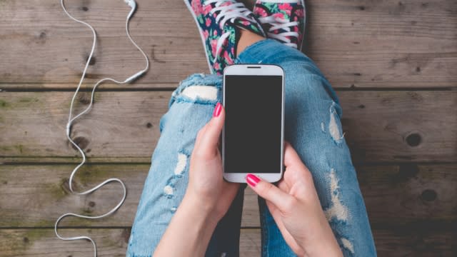 A girl using a cell phone