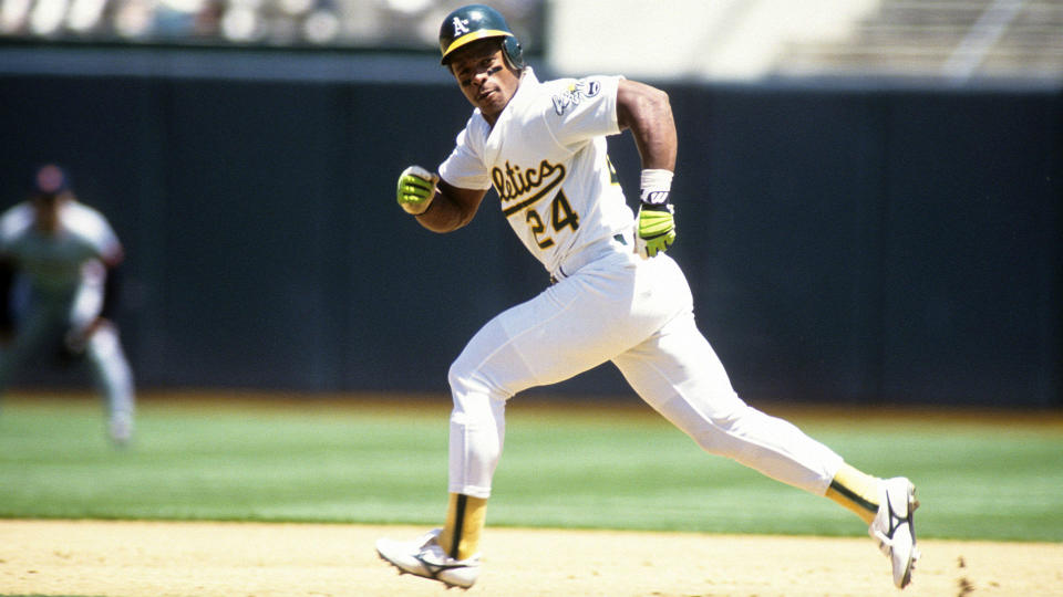 Rickey Henderson wanted to be a two-sport star and play for the Raiders, but the A's said no. (AP)