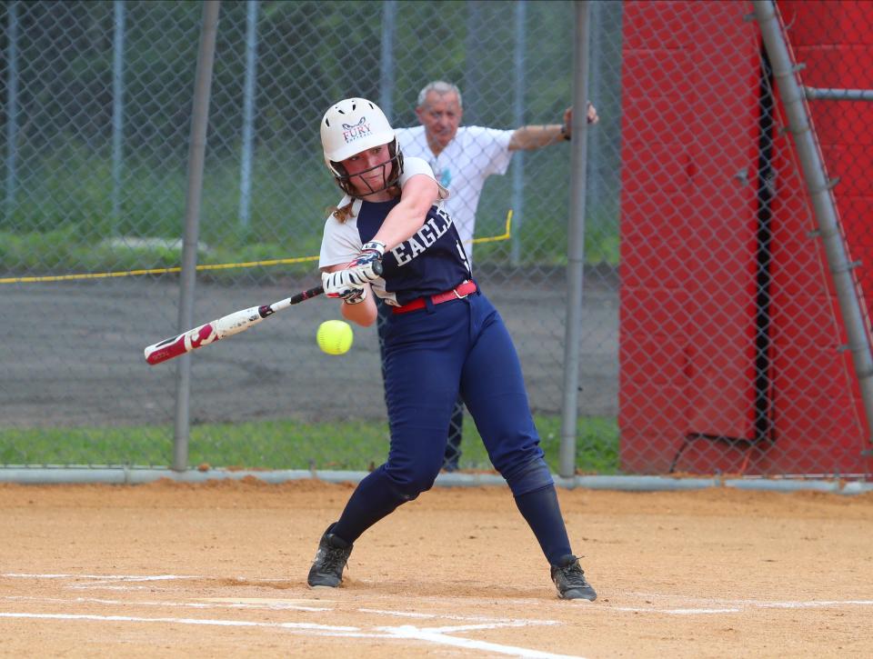 Yonkers Montessori Academy's Mackenzie Moccia connects with a pitch. She will be playing at Western Connecticut State University next season.