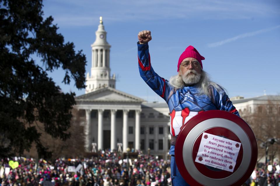 Ron Booth is dressed as 'A Captain America' during the Denver's Women's March at the Civics Center Park.