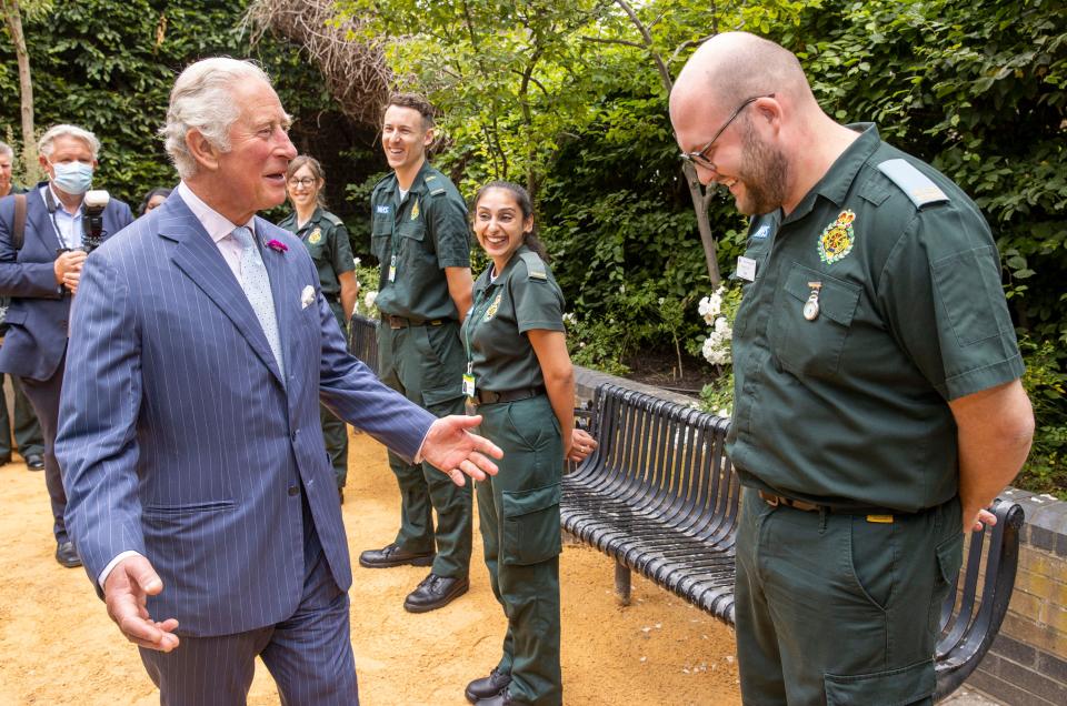 Britain's Prince Charles, Prince of Wales (L) meets with staff during a visit to Chelsea & Westminster Hospital in London on June 17, 2021. (Photo by Steve REIGATE / POOL / AFP) (Photo by STEVE REIGATE/POOL/AFP via Getty Images)