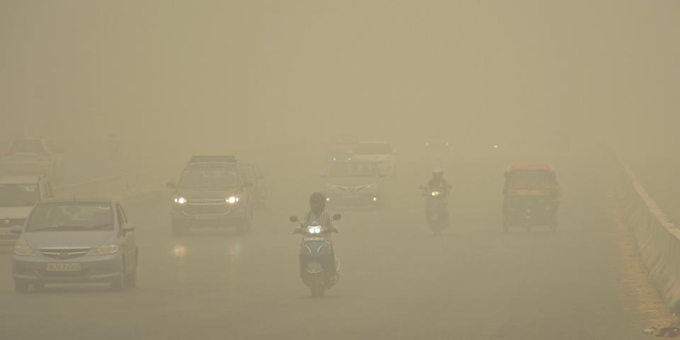 Vehicles ply on road amid heavy smog, at NH 9 road, on November 3, 2019 in Ghaziabad, India.
