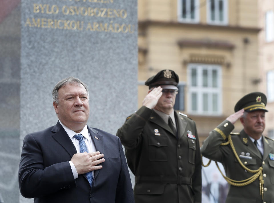 U.S. Secretary of State Mike Pompeo, left, attends a ceremony at the General Patton memorial in Pilsen near Prague, Czech Republic, Tuesday, Aug. 11, 2020. U.S. Secretary of State Mike Pompeo is in Czech Republic at the start of a four-nation tour of Europe. Slovenia, Austria and Poland are the other stations of the trip. (AP Photo/Petr David Josek, Pool)