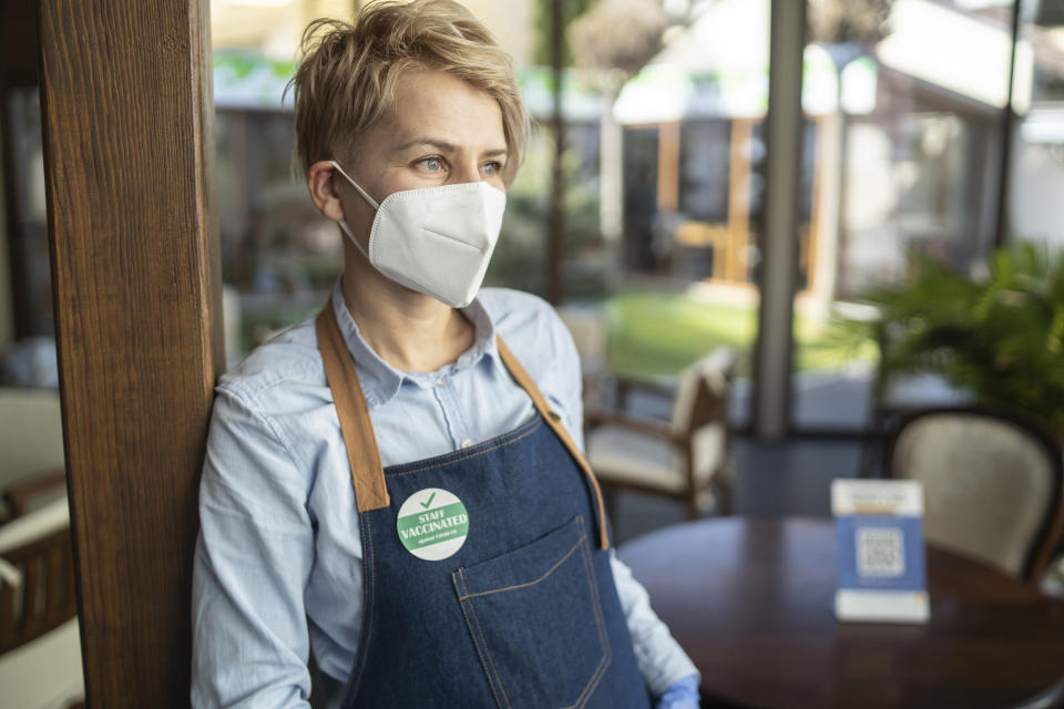 waitress in a mask