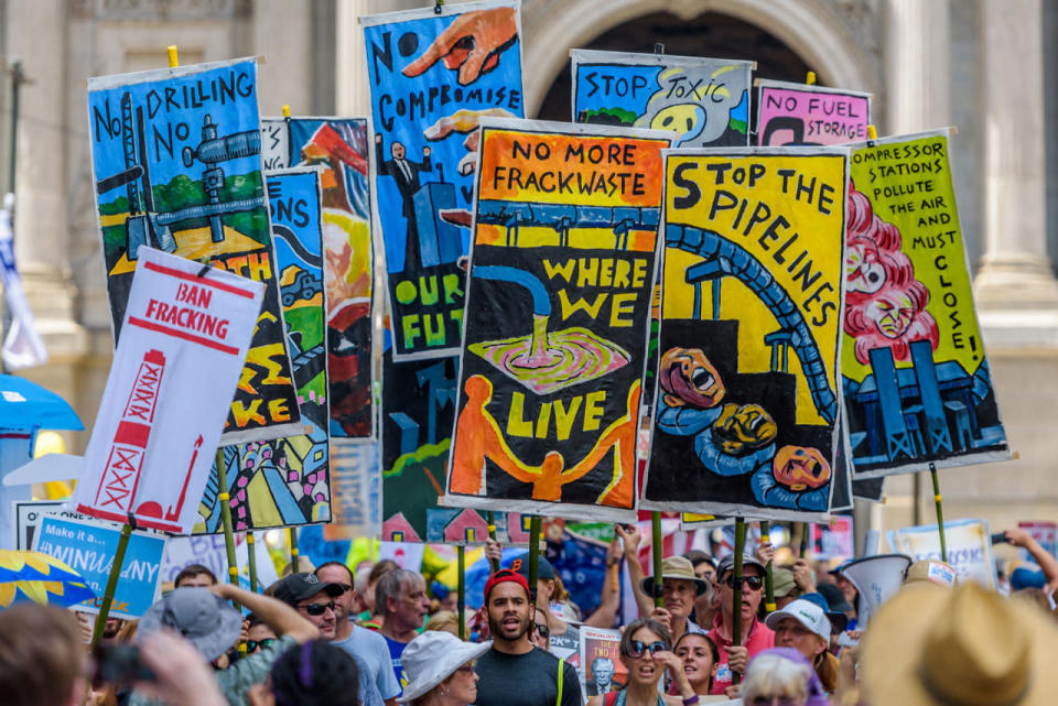 Demonstrators protest outside the DNC