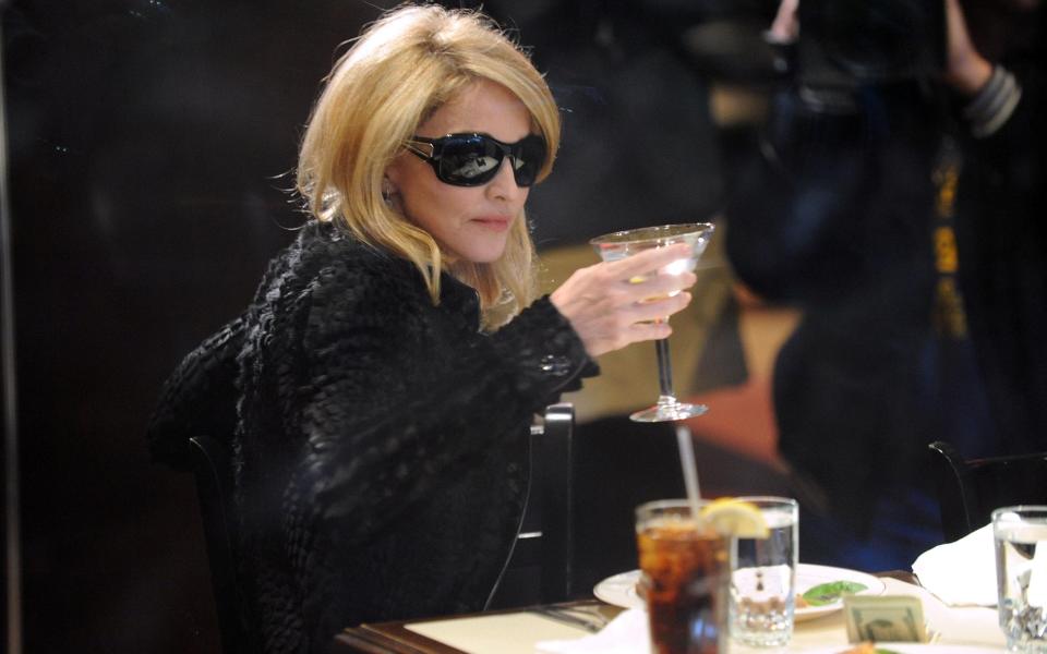 madonna drinking gin mert alas seventy one - Getty Images