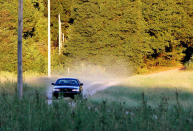 <p>Anderson County Coroner Greg Shore drives down Osbourne Road to a home where Jeffrey DeWitt Osborne was shot by his teenage son, who also fired shots at Townville Elementary School in Townville, S.C., on Sept. 28, 2016. (Nathan Gray/Reuters) </p>