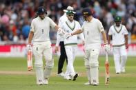 Cricket - England vs South Africa - Second Test - Nottingham, Britain - July 15, 2017 England's Joe Root celebrates his half century with Gary Ballance as they walk off at lunch Action Images via Reuters/Carl Recine