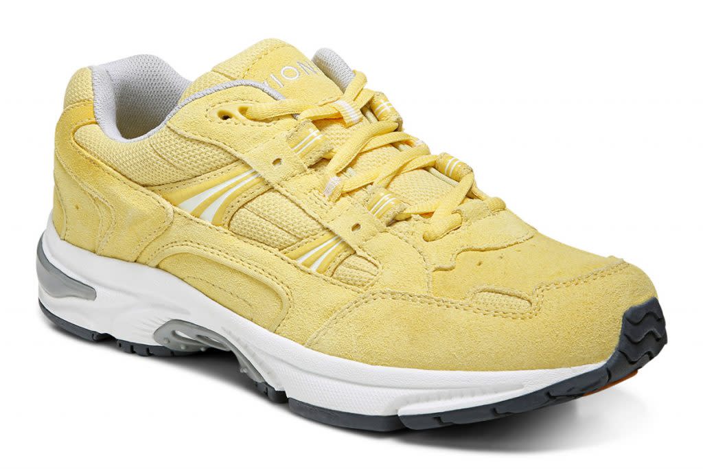 This is a product photo of a yellow Vionic Walker shoe against a white background. 