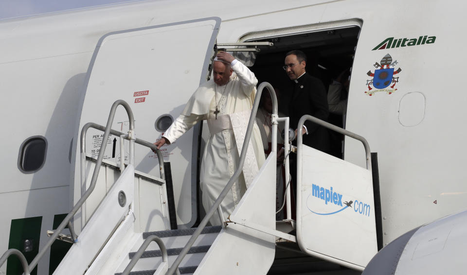 Pope Francis arrives to Tocumen international airport to attend World Youth Day events in Panama City, Wednesday, Jan. 23, 2019. Pope Francis will be in Panama Jan. 23-27. (AP Photo/Alessandra Tarantino)