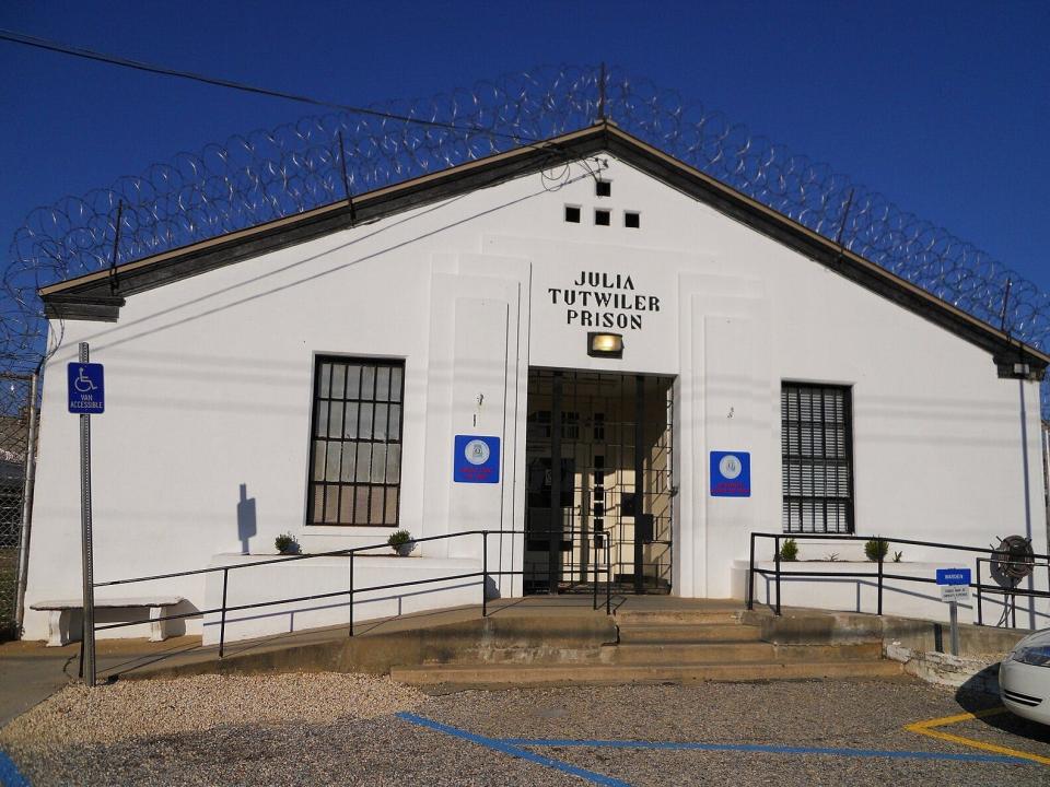 A white building labeled Julia Tutwiler Prison