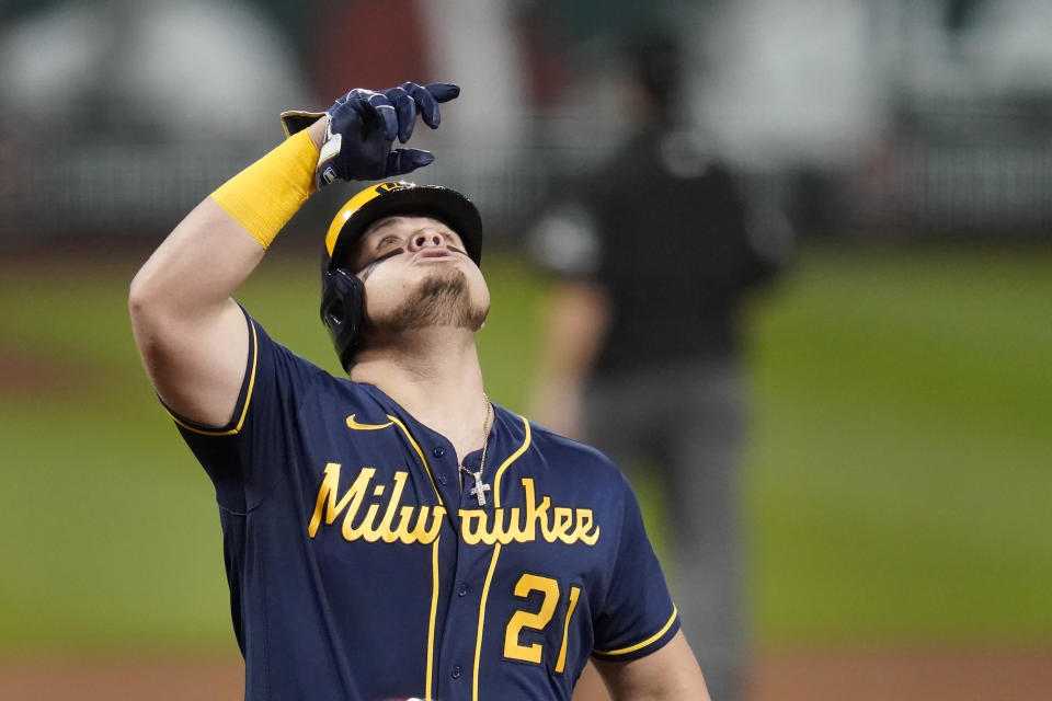 Milwaukee Brewers' Daniel Vogelbach celebrates after hitting a solo home run during the fourth inning of a baseball game against the St. Louis Cardinals Saturday, Sept. 26, 2020, in St. Louis. (AP Photo/Jeff Roberson)