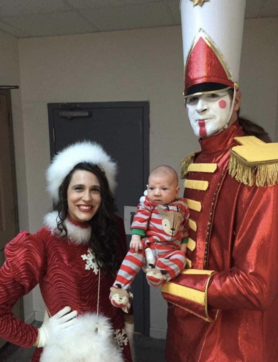 Larry and Toni Hoover pose for a photo with one of their three children at Silver Dollar City. Larry, known as "Shorty Hatfield" at Silver Dollar City, celebrated his 27th season at the park in 2023.