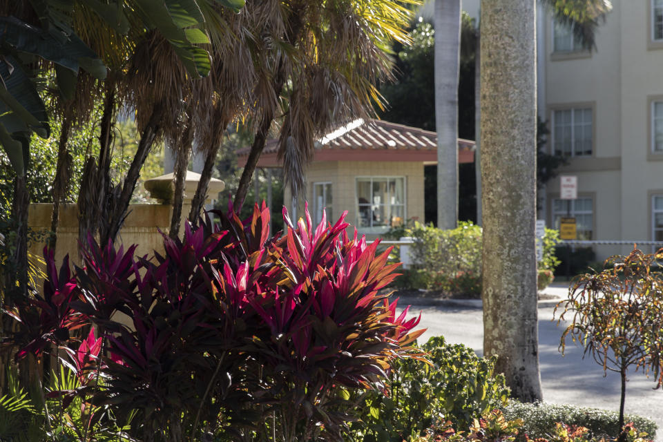 This photo shows the security gate at MorseLife Health System on Wednesday, Jan. 6, 2021, in West Palm Beach, Fla. Florida launched an investigation Wednesday into MorseLife Health System, a nonprofit that operates a nursing home and assisted living facility, amid reports that it administered coronavirus vaccines to wealthy donors and members of a country club along with its residents and employees. (AP Photo/Cody Jackson)