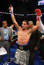 NEW YORK, NY - OCTOBER 20: Danny Garcia celebrates his fourth round knockout of Erik Morales during their WBC/WBA junior welterweight title at the Barclays Center on October 20, 2012 in the Brooklyn Borough of New York City. (Photo by Al Bello/Getty Images for Golden Boy Promotions)