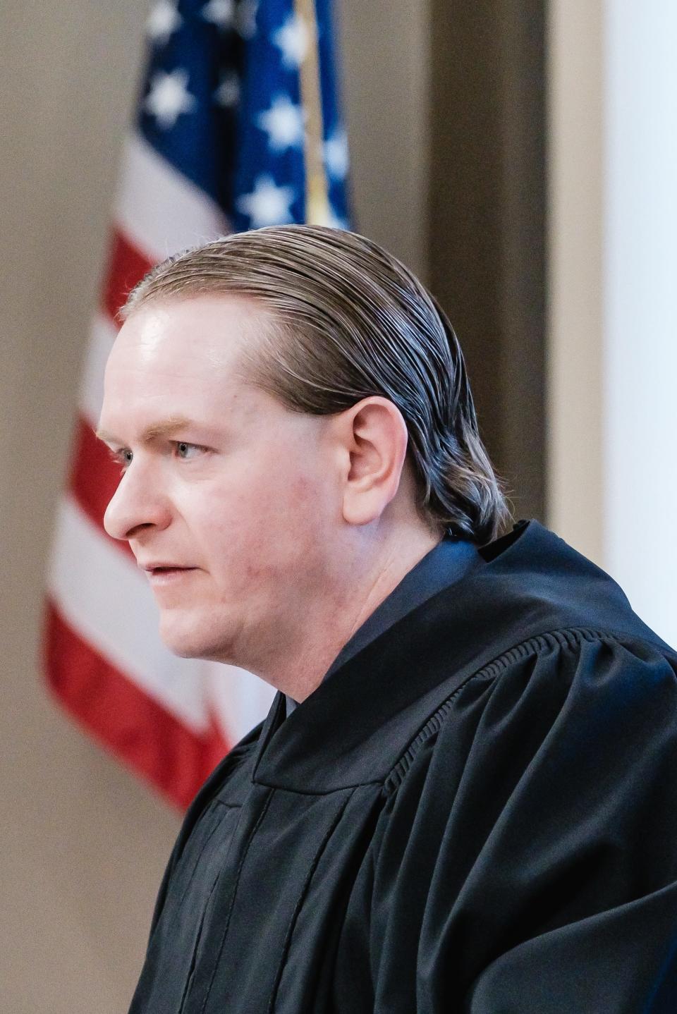 Magistrate Michael Daily addresses Jeremiah M Johnson of Sugarcreek as he is arraigned on 10 counts of failure to pay sales taxes. Johnson is a member of the Tuscarawas County Board of Elections, and is compensated by taxpayers.