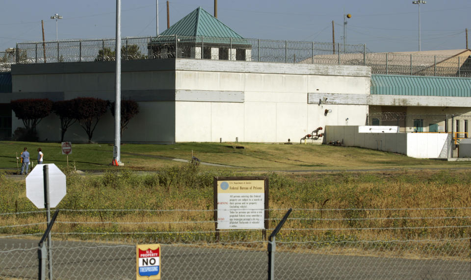 FILE - This July 20, 2006, file photo, shows the Federal Correctional Institution in Dublin, Calif. A representative for Felicity Huffman Tuesday, Oct. 15, 2019, says the actress has reported to the federal prison in California to serve a two-week sentence in the college admissions scandal. (AP Photo/Ben Margot, File)